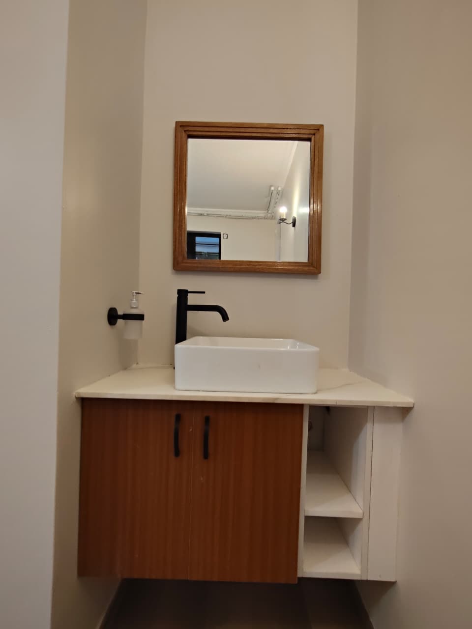 Custom hardwood bathroom vanity by Rhinewoods